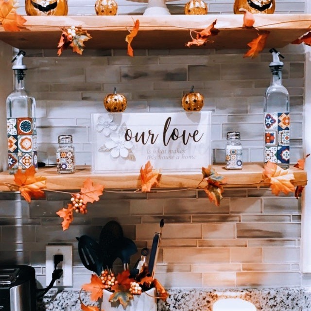 Halloween decor on floating shelves 