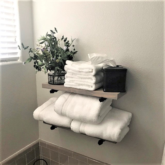 floating shelves with towels on them