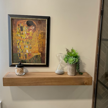 floating shelves for gallery wall