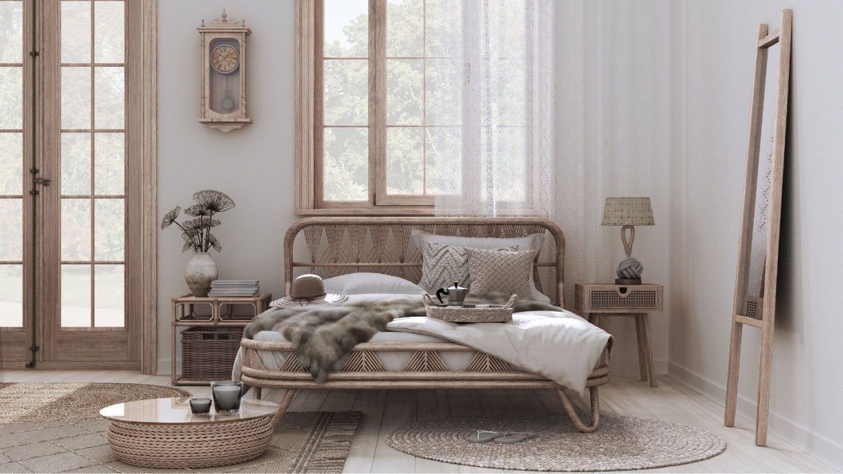 a staged bedroom with a beige monochrome palette and natural woods