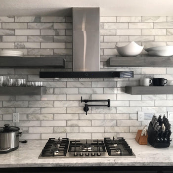 organized kitchen with floating shelves