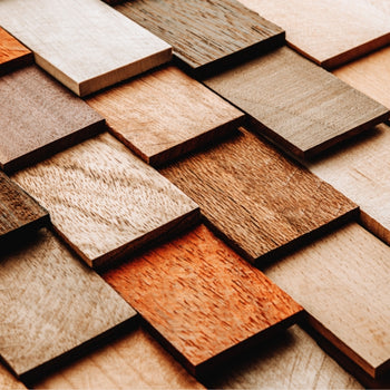 photo of an overlapping set of rectangular wood samples in a multitude of species